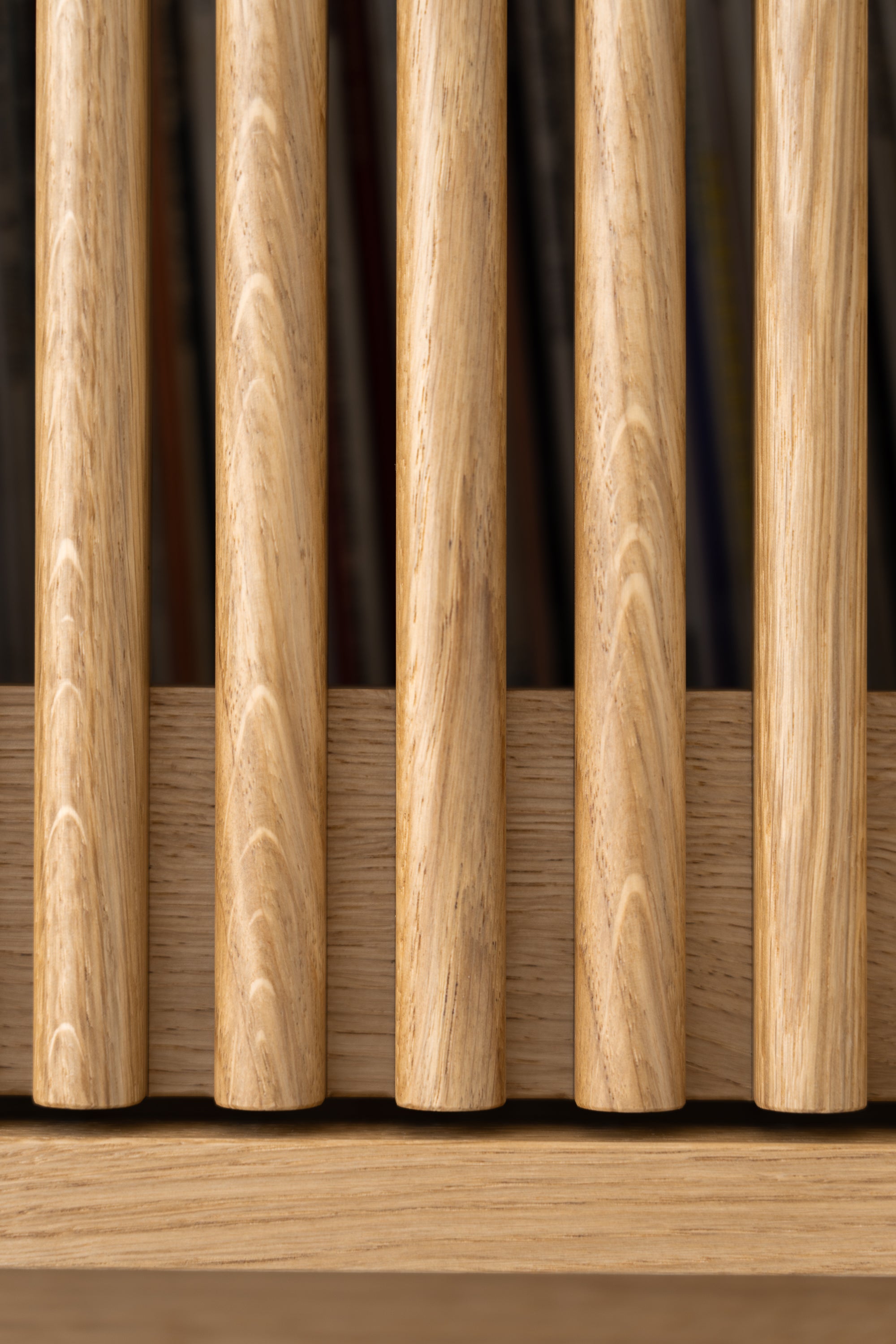 Close-up of vertical wooden slats with a blurred background.