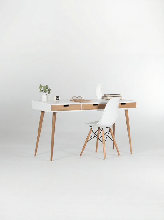 HEIM 140 white desk with drawers in oak wood, angled view with natural oak fronts and a white shell chair