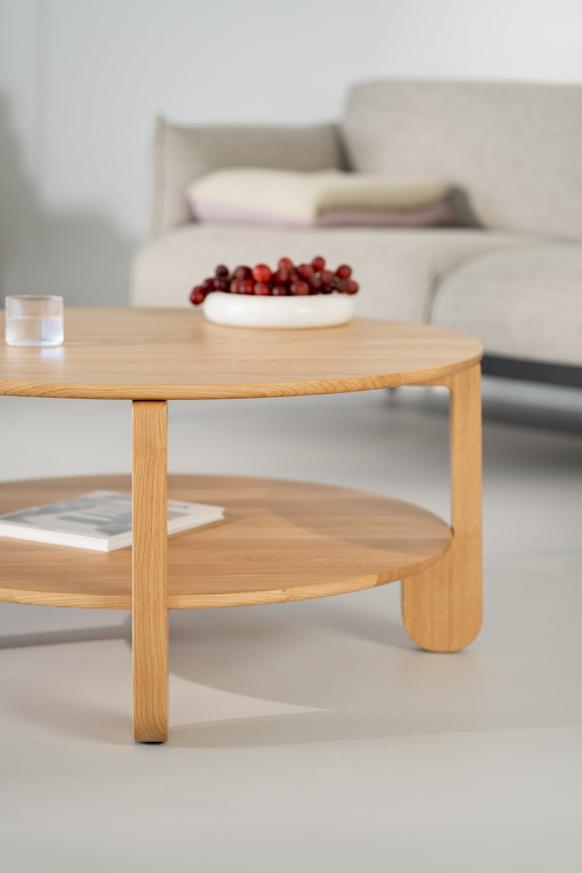 Detail of NOON table leg meeting the round oak tabletop, clean joint visible