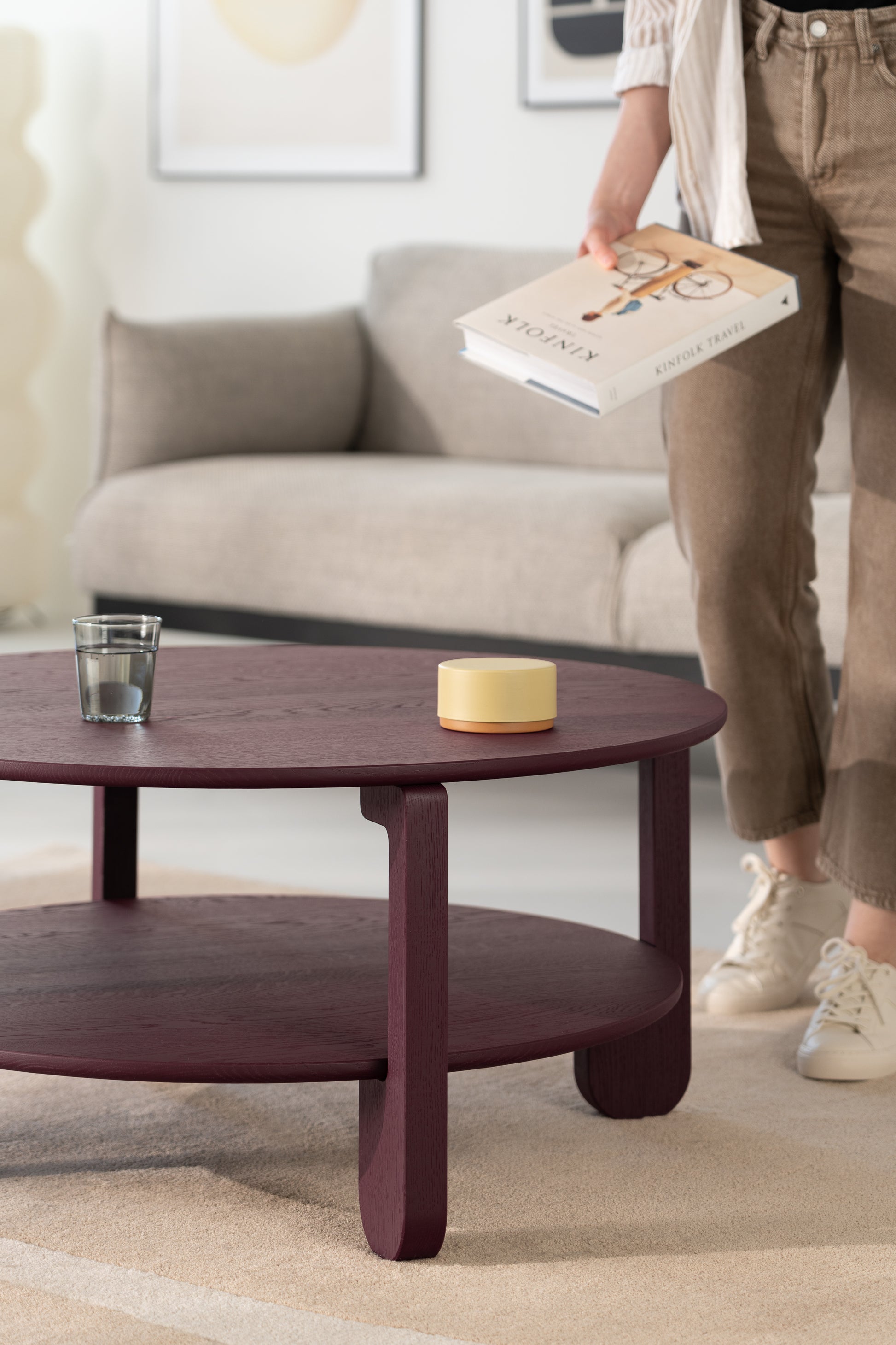 Underside of the NOON round table showing solid oak construction and leg attachment