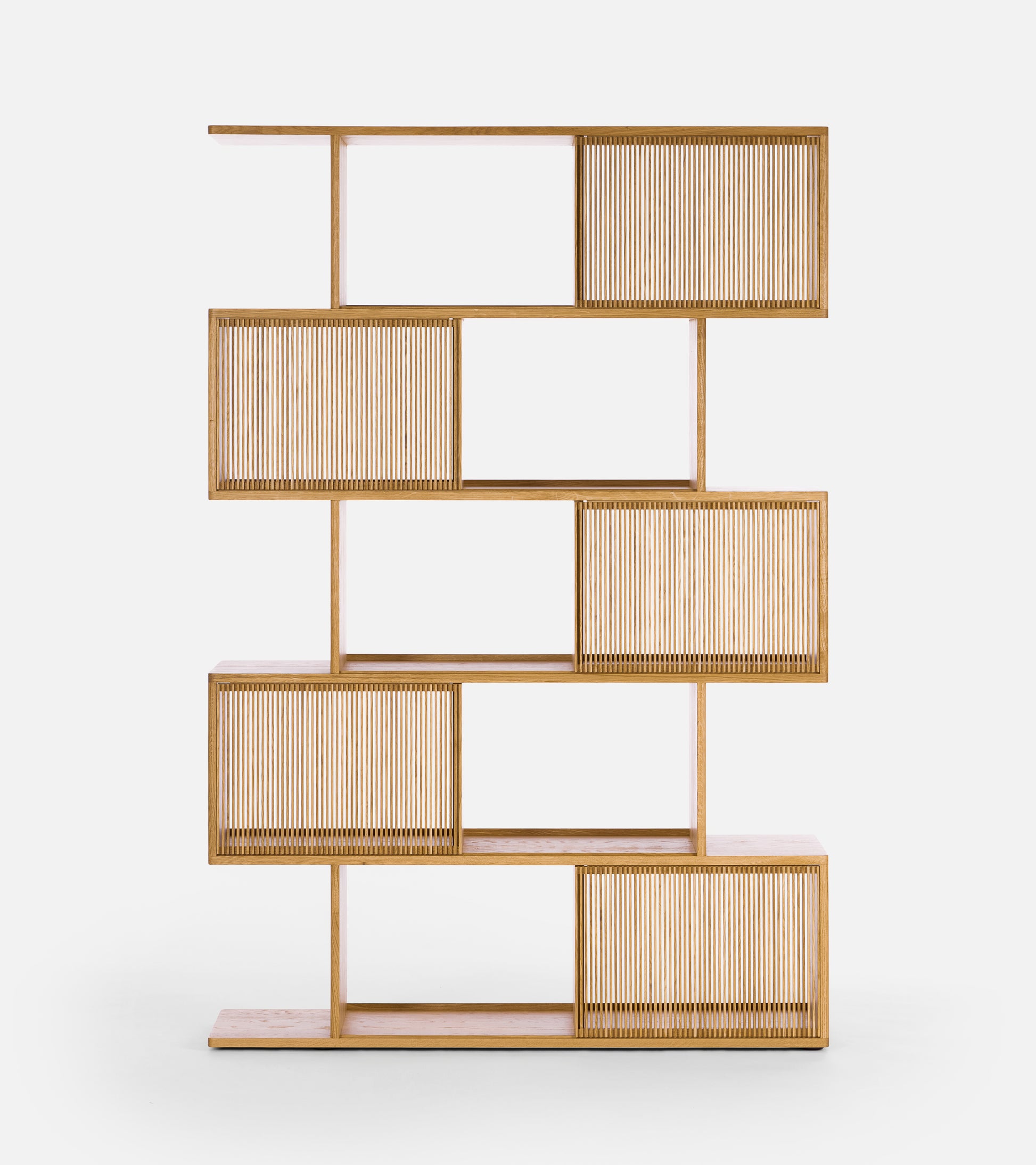 Wooden shelving unit with vertical slats and staggered open sections.