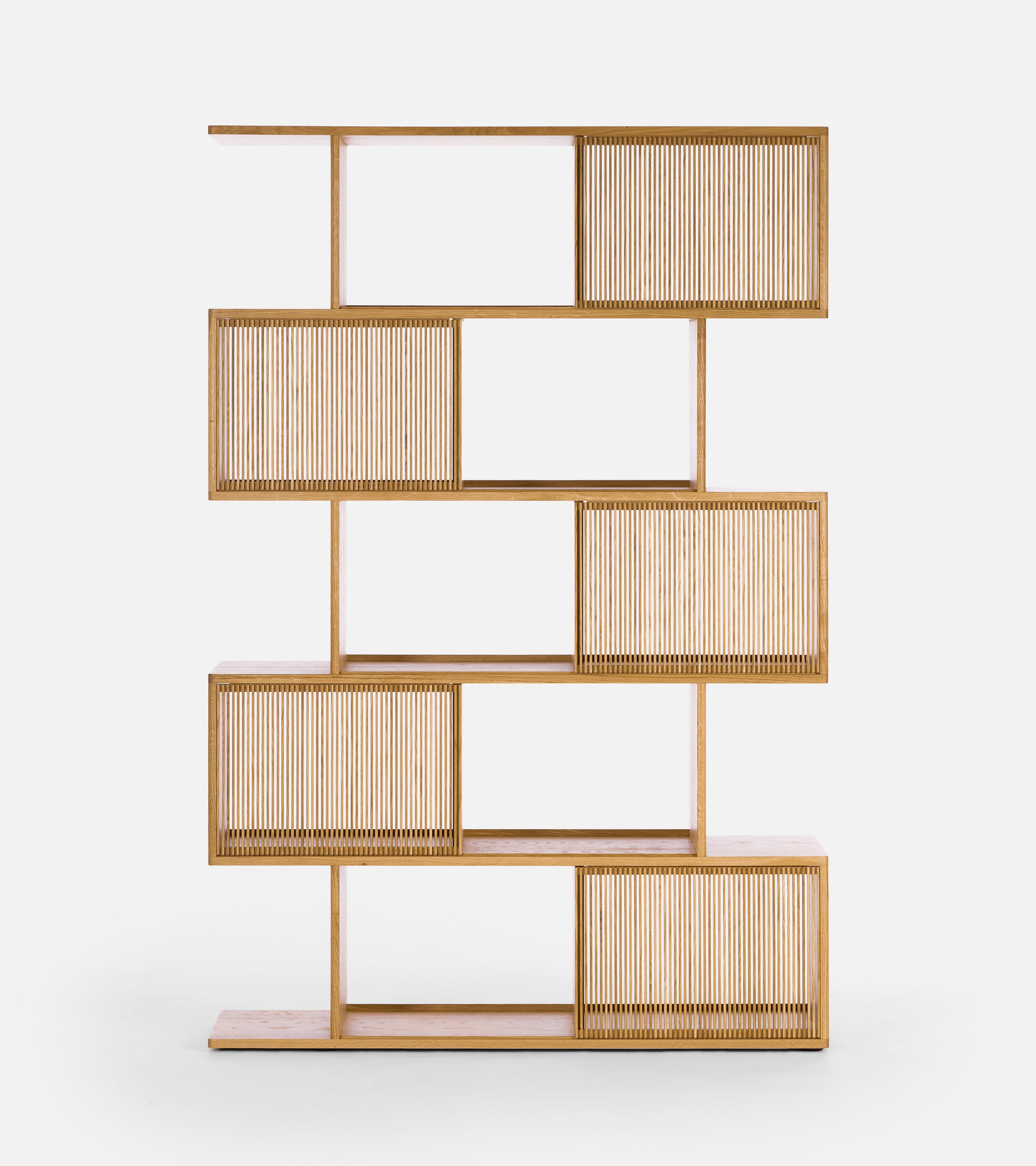 Wooden shelving unit with vertical slats and staggered open sections.