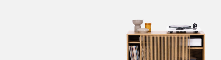 Solid oak cabinet with sliding fronts on a white background. Audio Cabinets