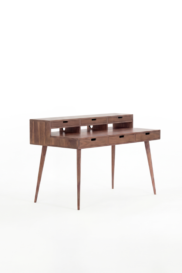 HEIM 140 in solid walnut at an angle, with six wooden drawer fronts and semicircular openings at the back of the hutch