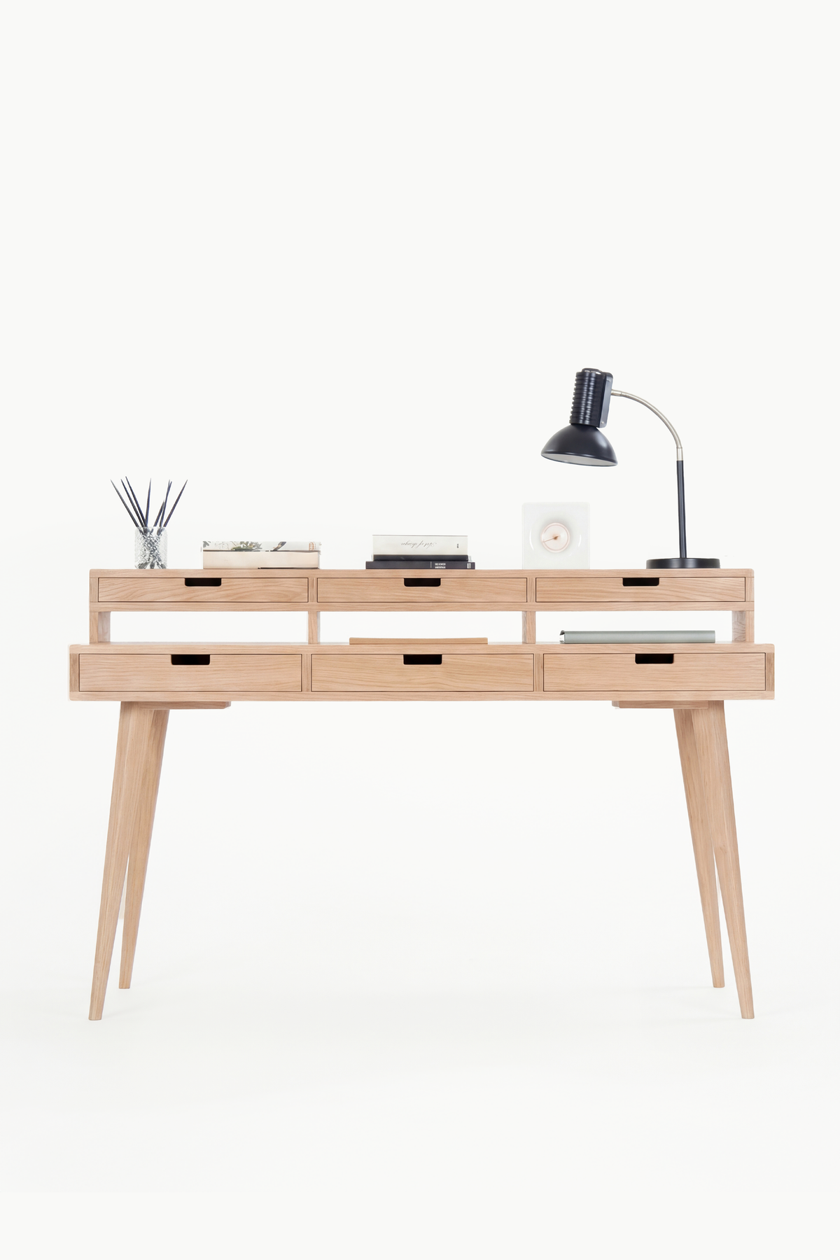 HEIM 140 desk with hutch and drawers in solid oak, front view showing six wooden fronts and open niches