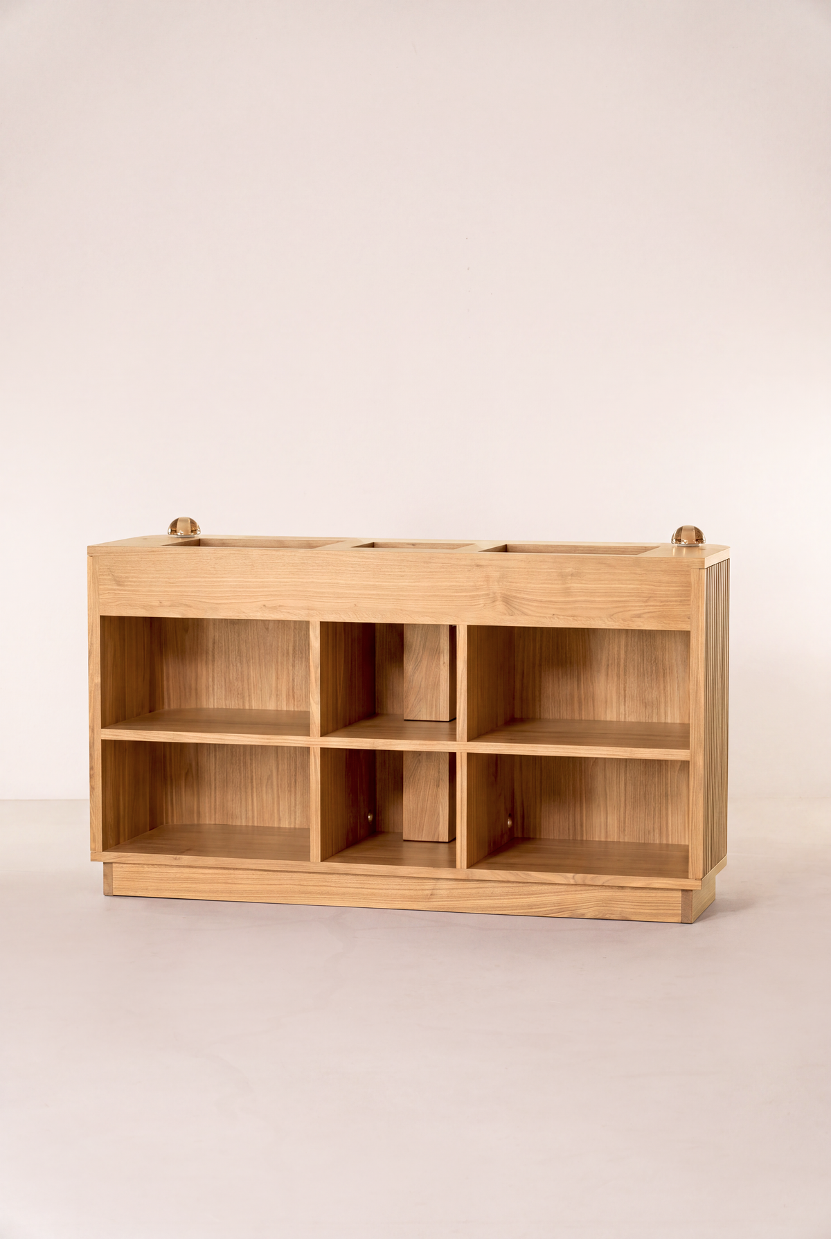 LOOP in solid oak, seen from the rear with six empty compartments and cable openings