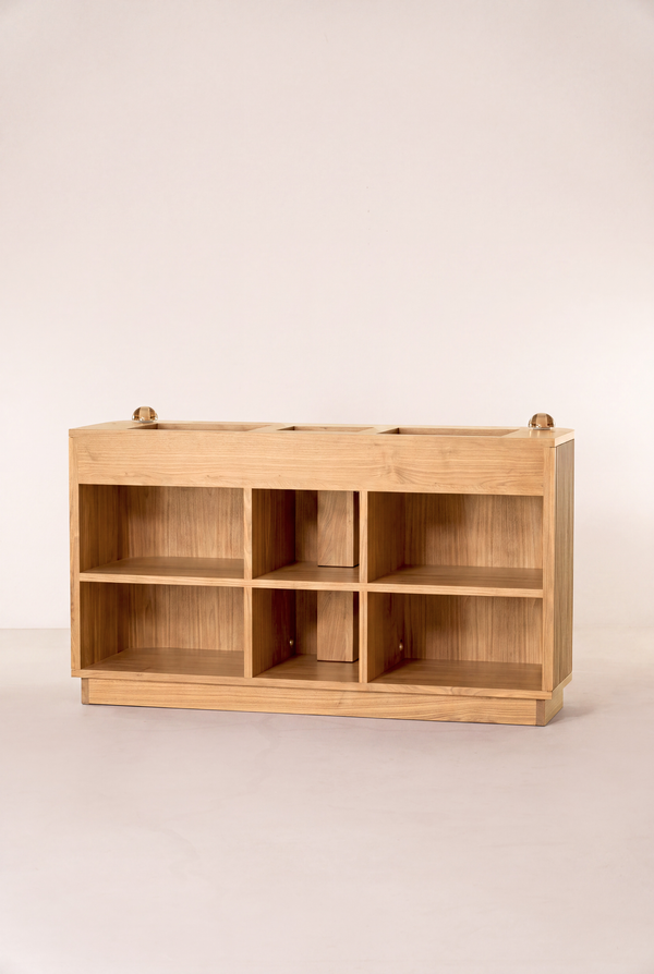 LOOP in solid oak, seen from the rear with six empty compartments and cable openings