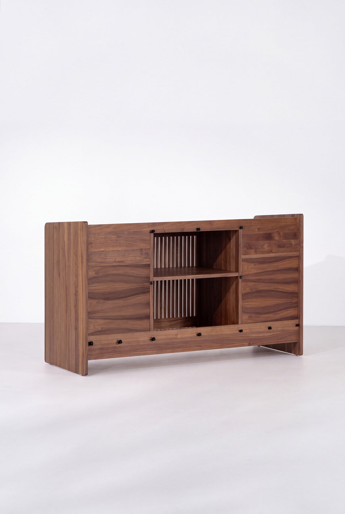 Rear view of the empty FUSE X in solid walnut, with an open back, a shelf and black fasteners on the frame