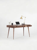 HEIM 140 office desk with drawers in solid walnut, angled view with the right drawer open to show its light plywood side
