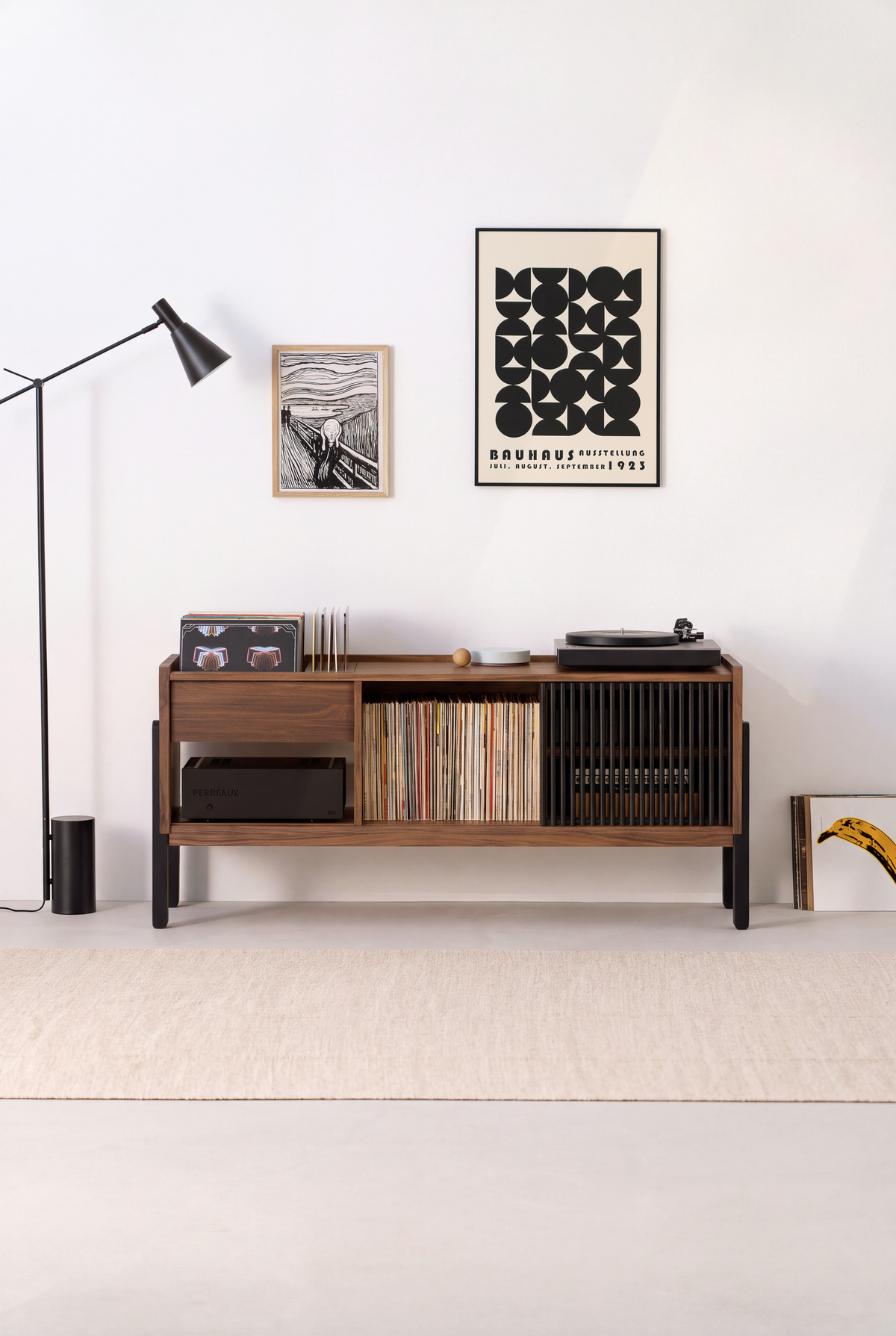 VIBE record player credenza in solid walnut, front view with a closed upper left compartment and amplifier below