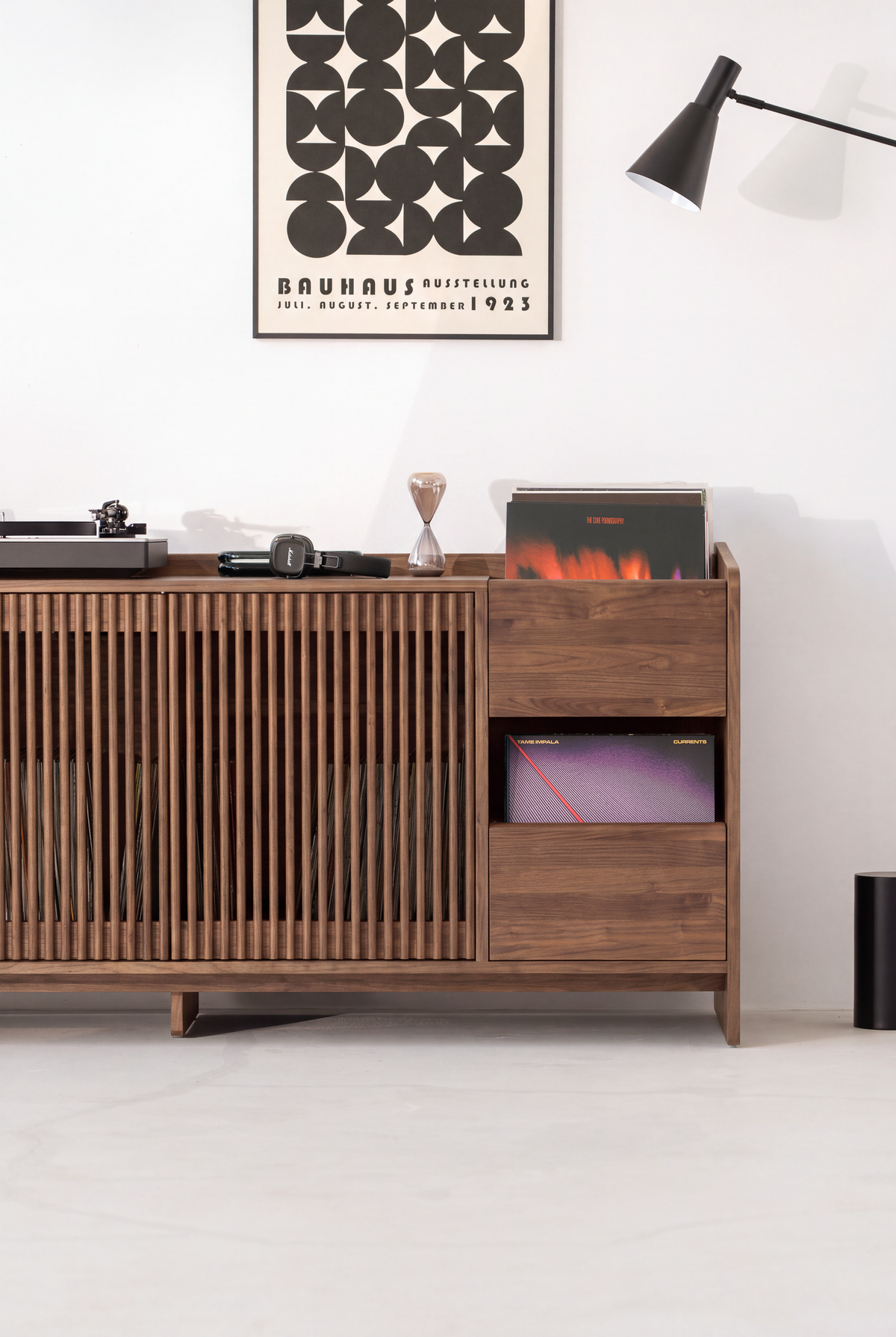 FUSE XX in solid walnut, front view of the right section with closed slatted doors, an end niche and drawer