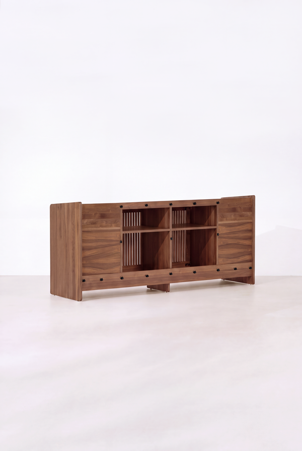 Back of the empty FUSE XX in solid walnut, with two open center compartments, shelves and black fasteners