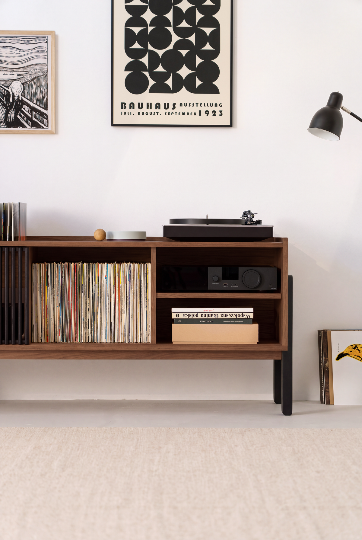 VIBE in solid walnut, right section with records beside two shelves holding an amplifier and books, turntable above