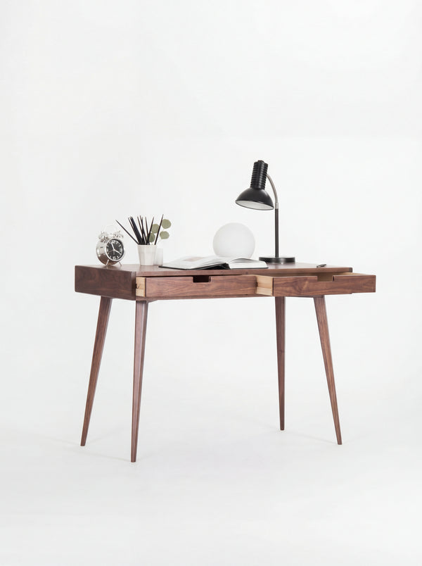 HEIM 105 desk in walnut wood with both drawers slightly open, revealing light plywood sides