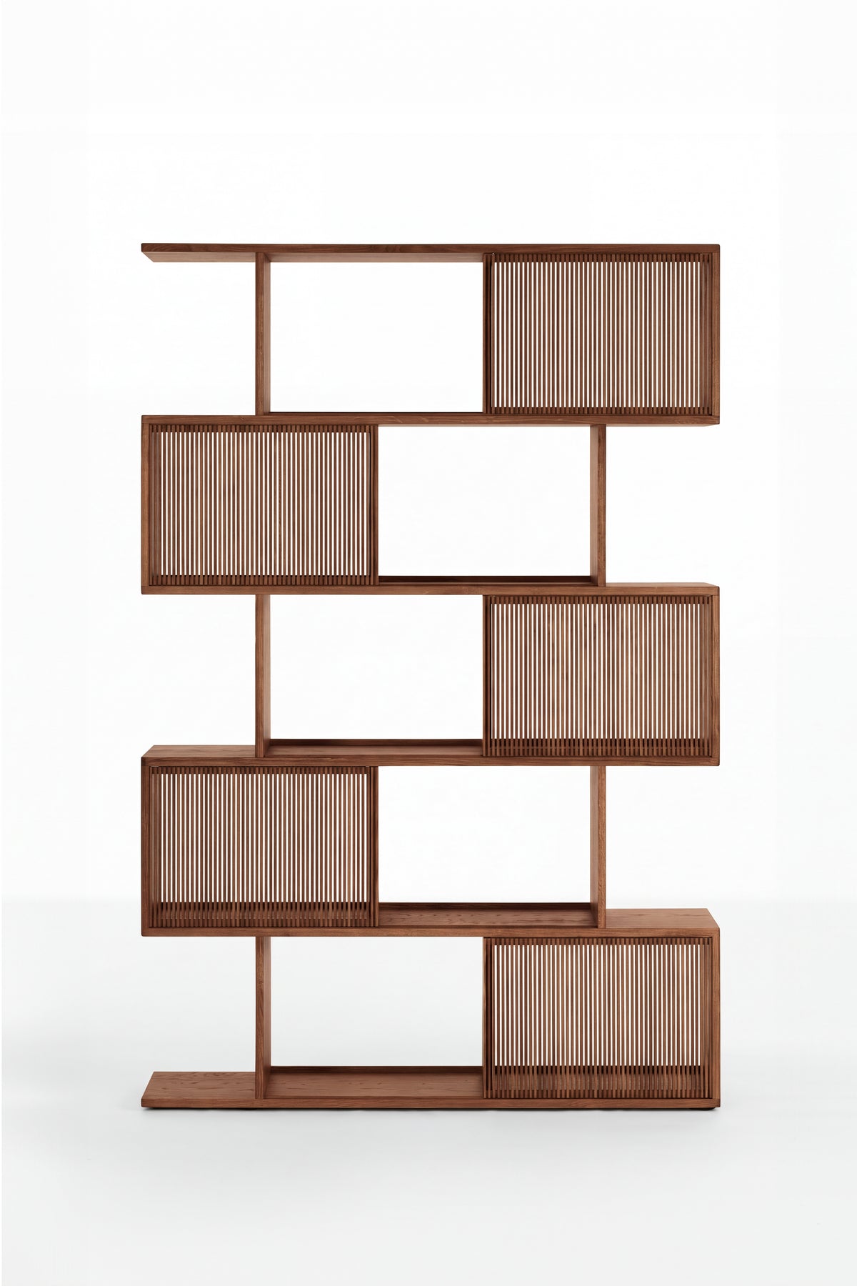 Empty MOLL DUO bookcase in solid walnut, seen head-on with alternating slatted fronts on a white background