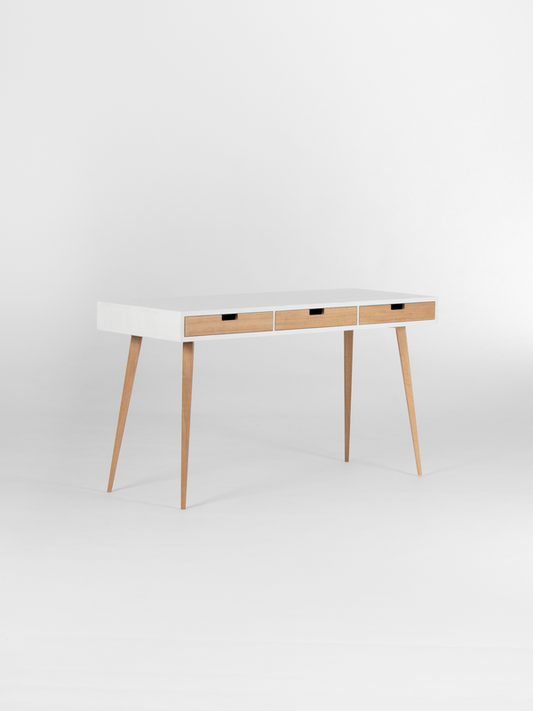 Three natural oak drawer fronts on the HEIM 140 desk in solid oak, shown empty at an angle with a white body