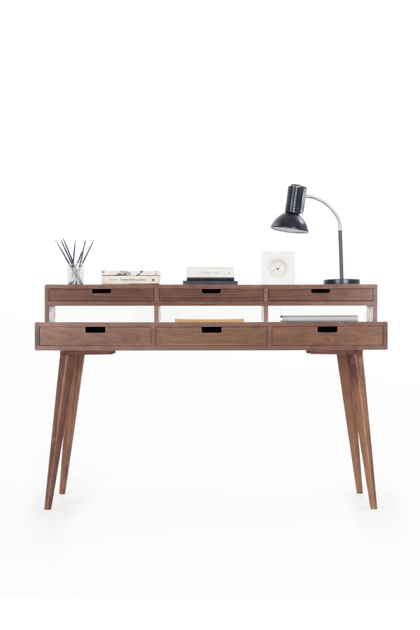 HEIM 140 wood desk with hutch in solid walnut, front view showing six drawers and open niches