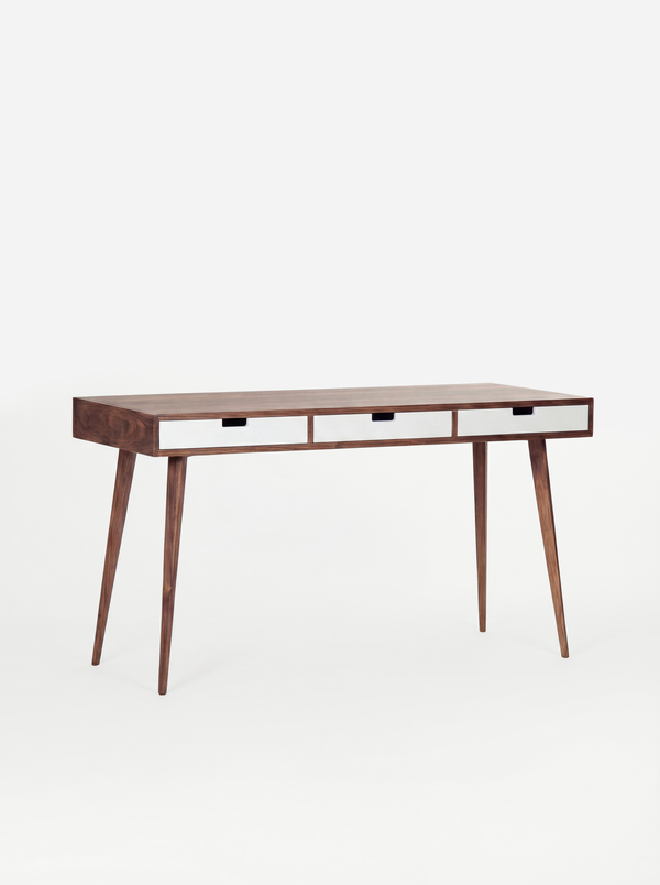 Three white drawer fronts on the empty HEIM 140 desk in walnut wood, viewed at an angle on a white background